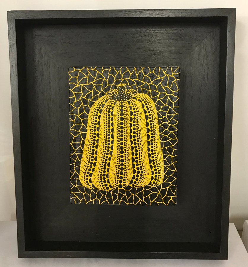 Framed yellow and black pumpkin painting, shown as an example inventory record